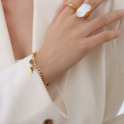 チタンメッキ18ゴールド純手作りのユニーク ホワイトヘベリング指輪
