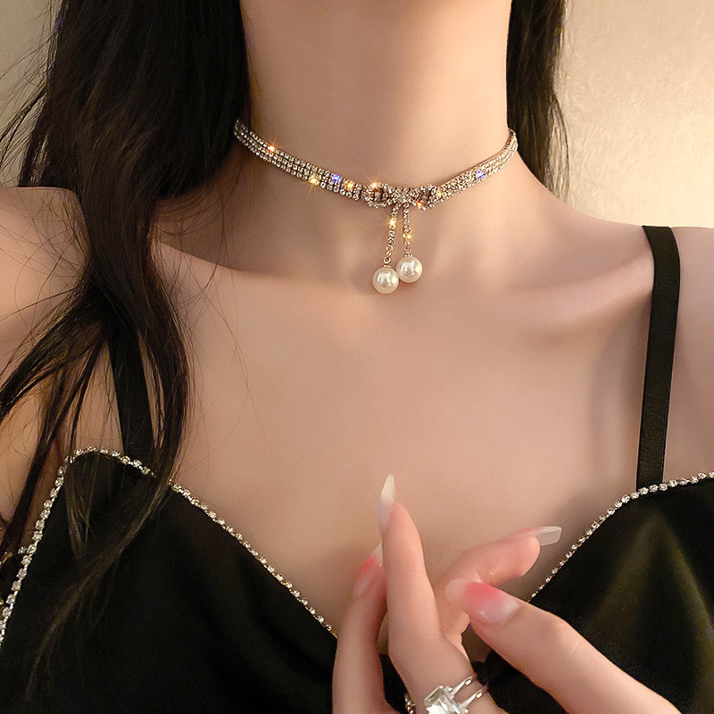 輝く 鎖骨チェーン パールとダイヤモンドの弓ネックレス 韓国のファッション チョーカー