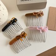 リボンヘアコーム　アクリル　ヘアアクセサリー　デザイン　髪飾り