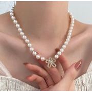 韓国のファッション新パール象嵌ダイヤモンドフラワーネックレス女性の高級 気質ネックレス