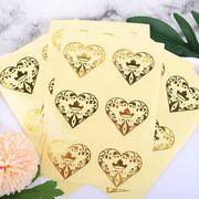 業務用品　粘着シール　包装資材　ステッカー