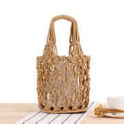 レトロモダンで透かし彫りの太綿糸編みバッグ手提げネットポケットカジュアルレディースバッグビーチバッグ