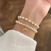 二層スタックパールフィッシュテールブレスレット、高級感 新しい 女性 のブレスレット